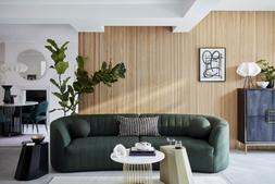 Izzie four-seater sofa in Forest Green bouclé