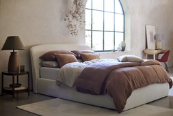 DFS Nario Lamp Table, available at DFS, Dwell Cordelia Medium Rug, available at DFS, DFS Cirrus King Size Ottoman Bed Frame in Cream Bouclé, Dwell Luto Home Office Desk, Liber Dining Chair, available at DFS
