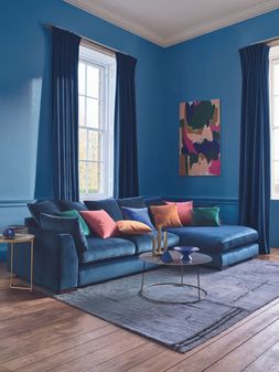 DFS Plush large chaise sofa in dark blue velvet