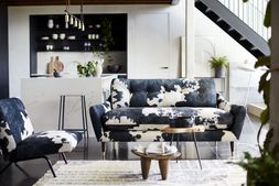 DFS Vegan Larch three-seater sofa in black cow Vegan Accent fabric, with DFS Vegan Cherish accent chair in black cow Vegan Accent fabric