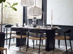 DFS Dwell Cosma dining table, available at DFS, Dwell Cosma dining chair in Black Oak and Rattan, available at DFS, DFS Macie Medium Rug