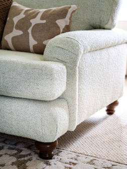 Hampton 2 Seater Sofa in Hampton Chunky Knit Chenille Natural/Burnt Sienna Mix with Walnut Feet, £1699. Hampton Accent Chair in Hampton Chunky Knit Chenille Natural/Burnt Sienna Mix with Walnut Feet, £799.