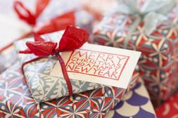 Pile of presents in Cambridge Imprint paper