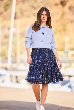 Betsy Bow Button Cardigan £50, Gabrielle Polka Dot Godet Skirt £48
