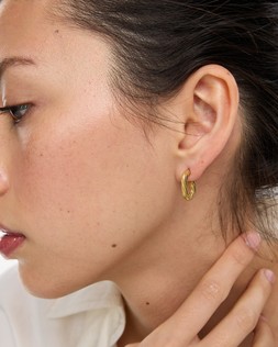 Macy Gold Tone Waterproof Oval Mini Hoop Earrings