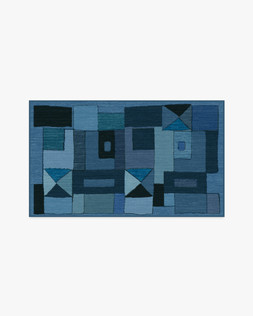 Ruggable - Jungalow Collection - Modra Indigo - 90 x 150 cm - Flatwoven £179, Tufted £239 (Aerial)EMBARGOED UNTIL 2ND JULY 2026EMBARGOED UNTIL 2ND JULY 2026