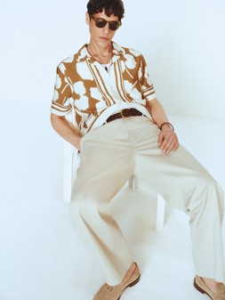 Autograph Shirt £40, Autograph Trousers £49, Sunglasses £35, Necklace £22.50, Belt £22, Bangle £22.50, Ring £14, Shoes £55