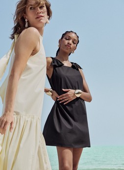 M&S HALTER DRESS £49.50, EARRINGS £15, BOW DRESS £39.50, GOLD EARRINGS £12.50, BANGLE £18