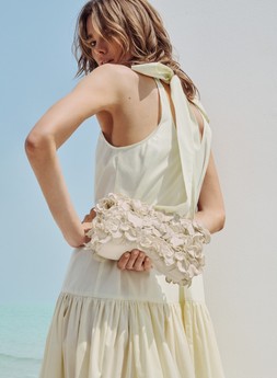 M&S HALTER DRESS £49.50, FLORAL BAG £49.50, EARRINGS £15